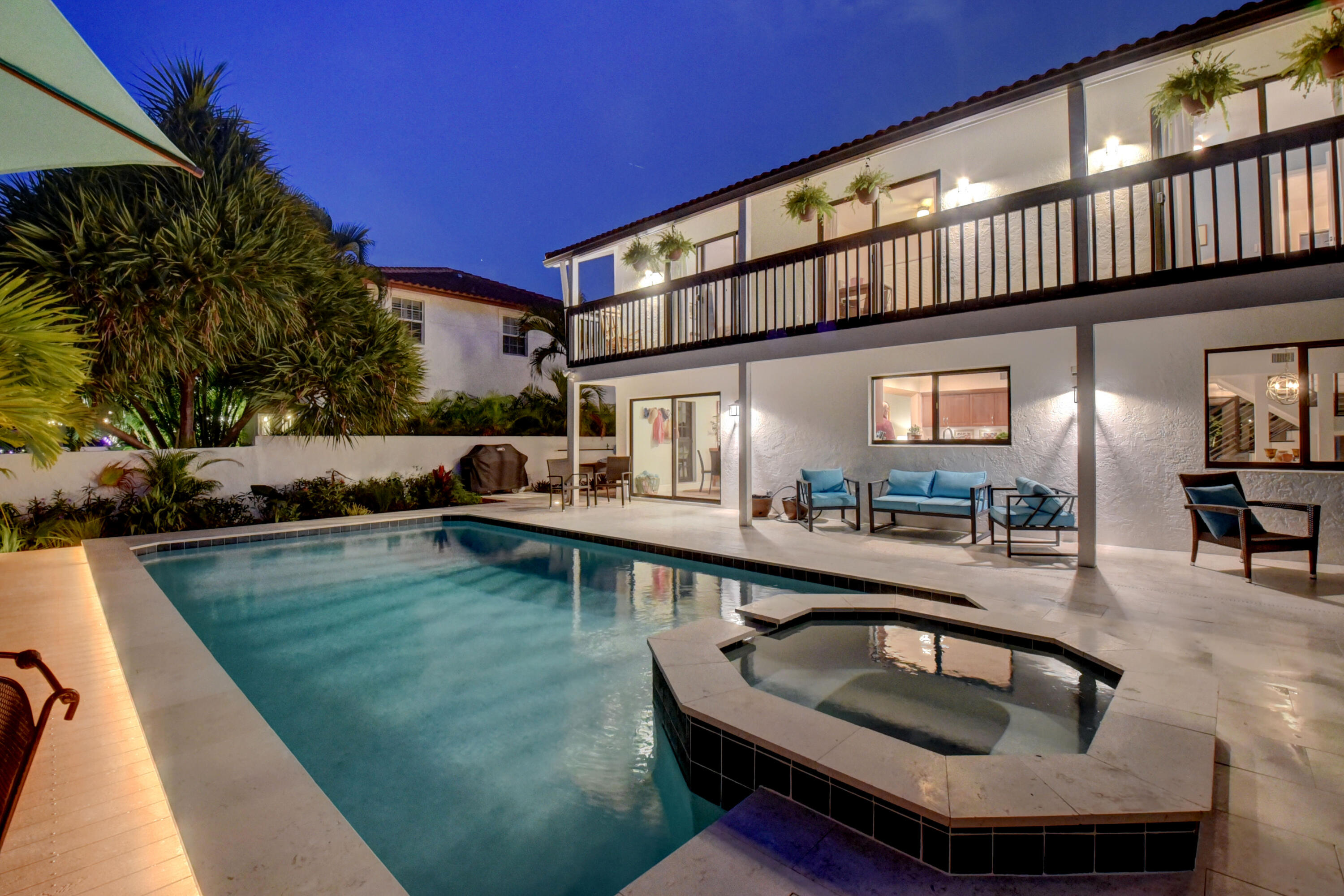 399 Southwest 15th Street Boca Raton, FL 33432 - Photo 6 of 49 a view of a house with swimming pool and sitting area