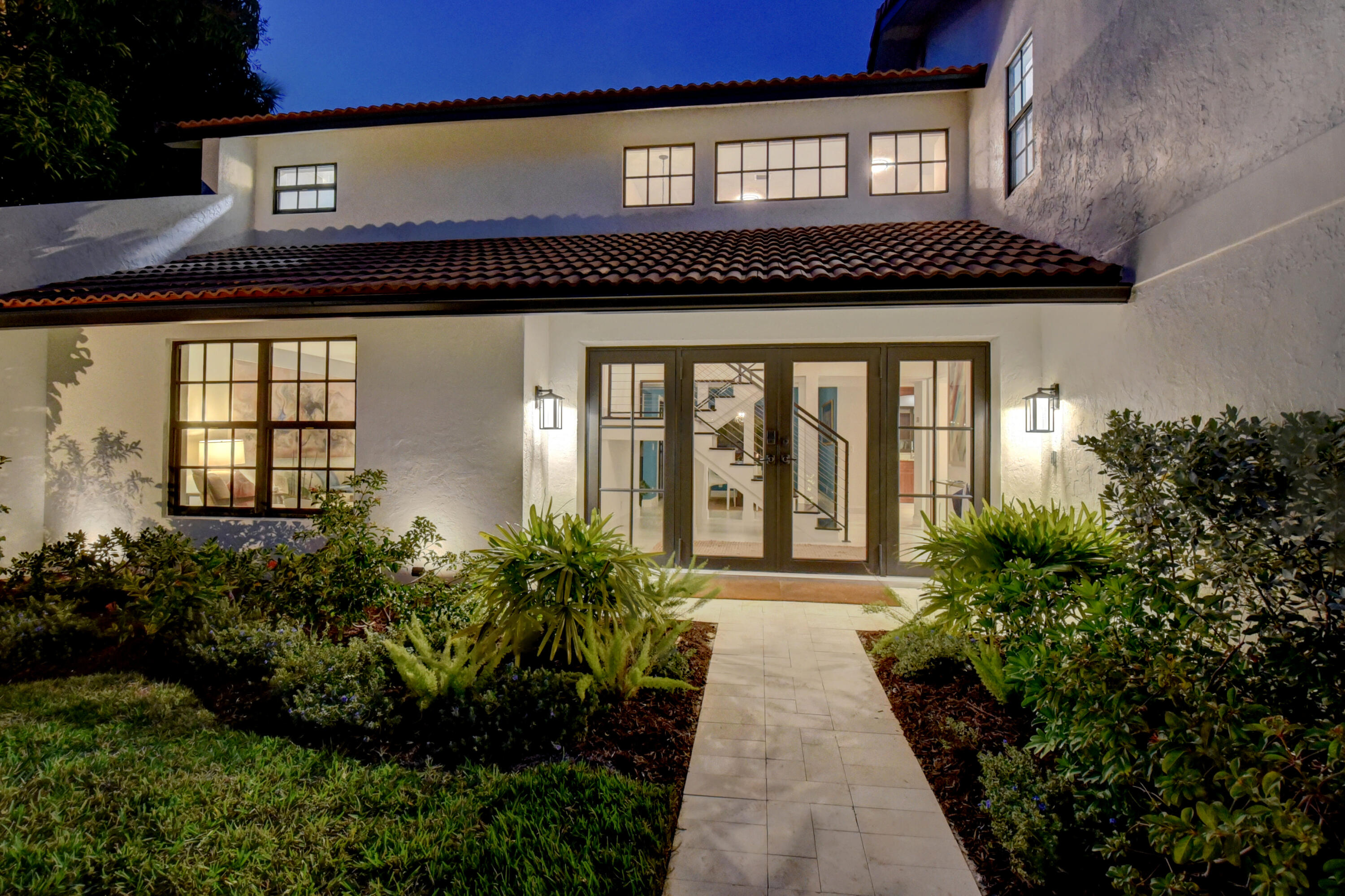 399 Southwest 15th Street Boca Raton, FL 33432 - Photo 9 of 49 a front view of a house