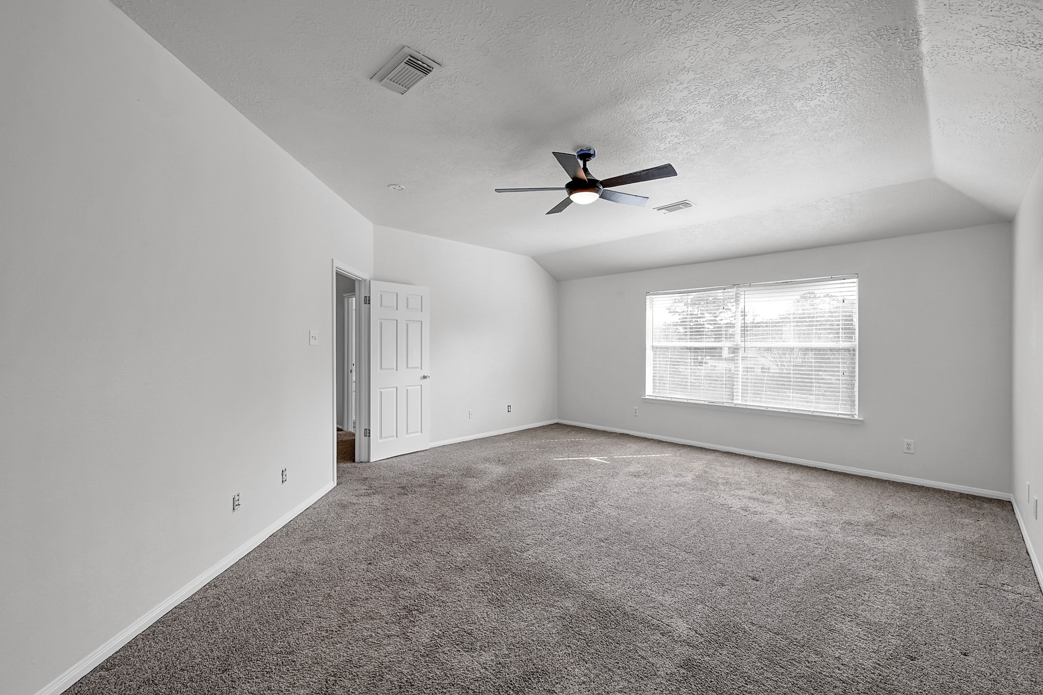 30818 Trinket Drive Spring, TX 77386 - Photo 20 of 29 a view of empty room with windows