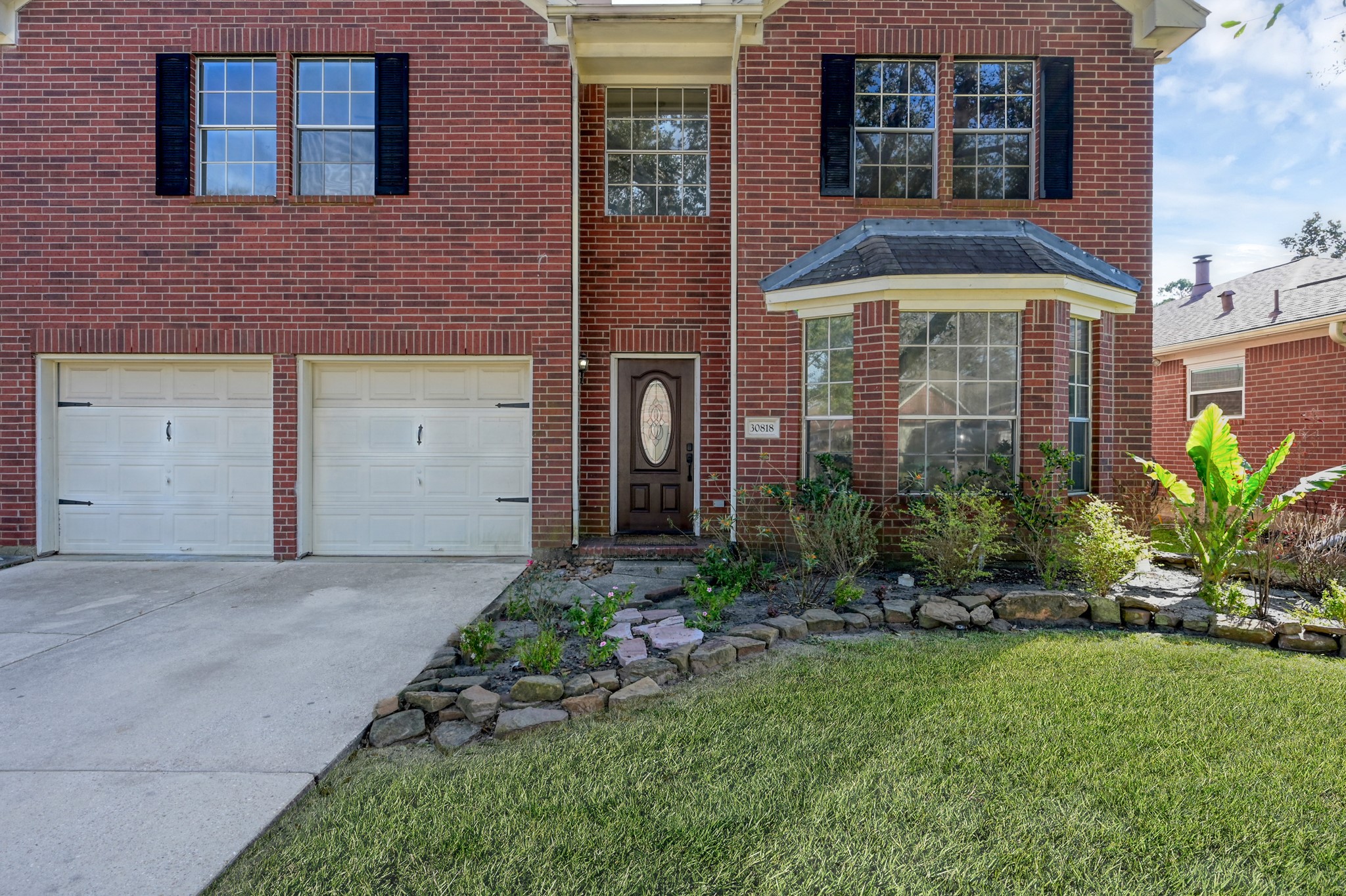 30818 Trinket Drive Spring, TX 77386 - Photo 2 of 29 a front view of a house