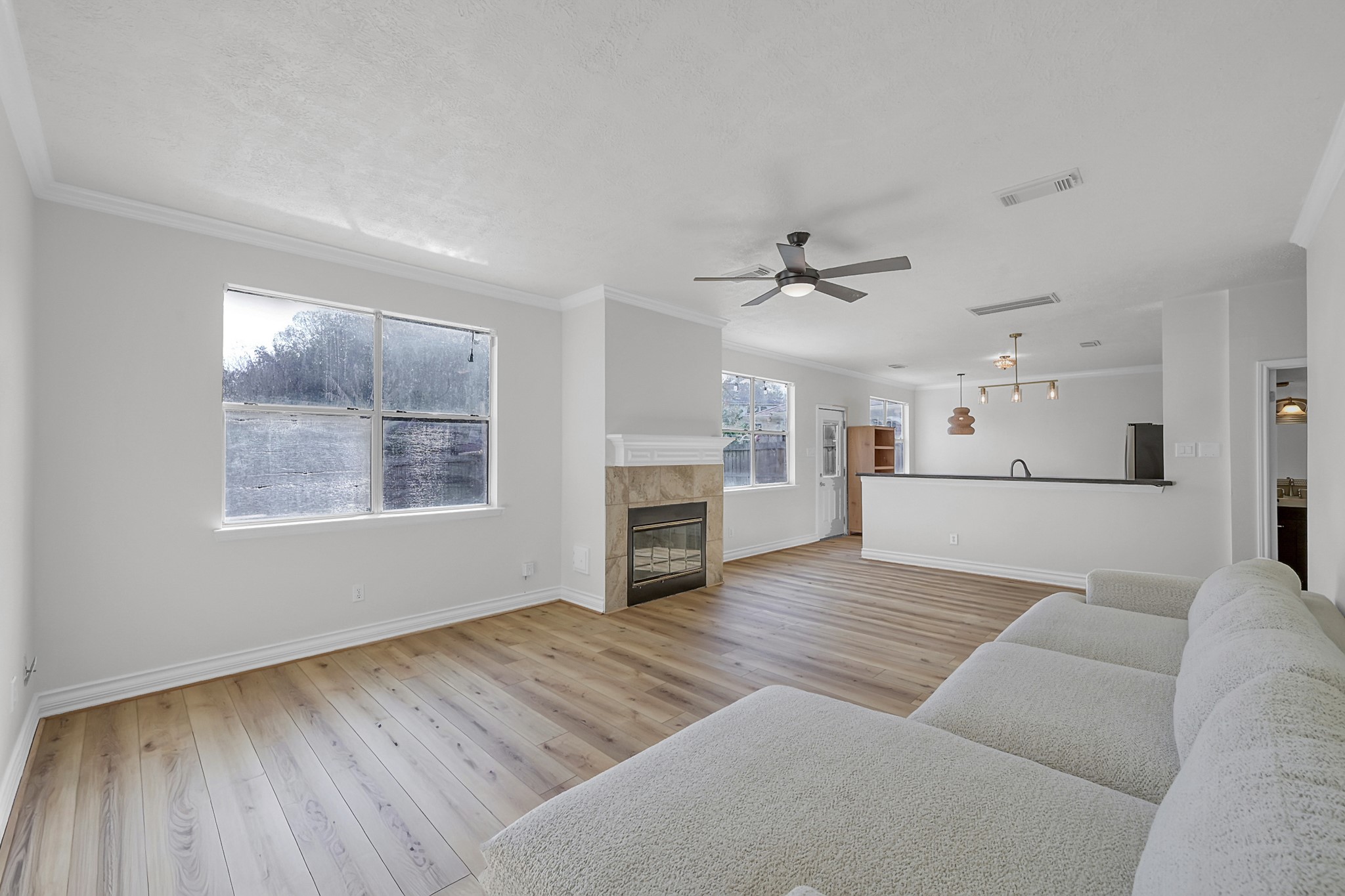 30818 Trinket Drive Spring, TX 77386 - Photo 8 of 29 a living room with furniture and a fireplace