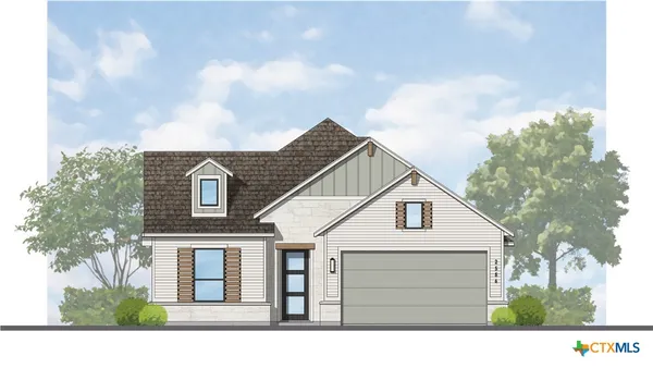 a front view of a house with a garage