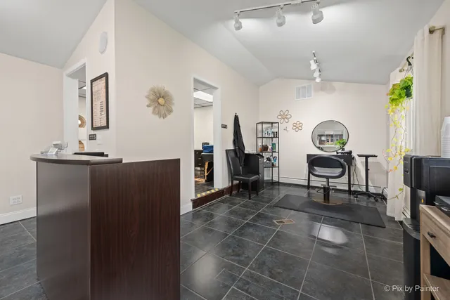 a room with furniture and wooden floor