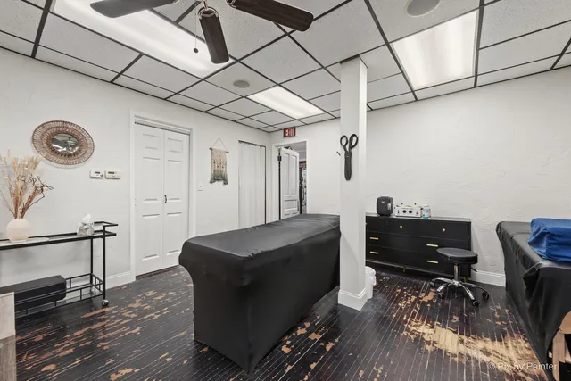 a view of a dining room with furniture wooden floor and a rug