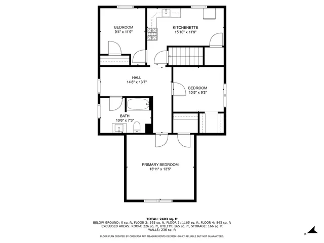 a white wall with paintings on wall and white walls