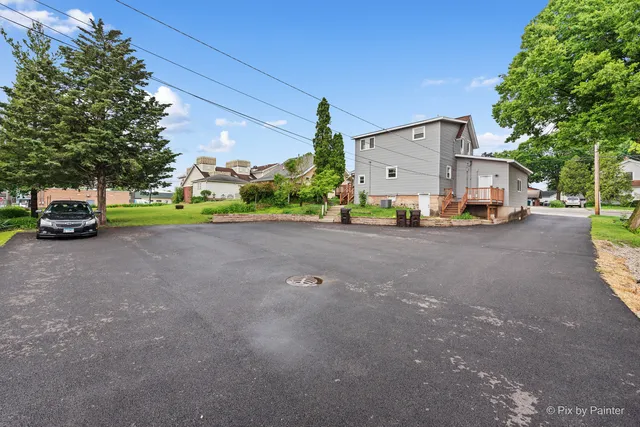 a view of a street with cars