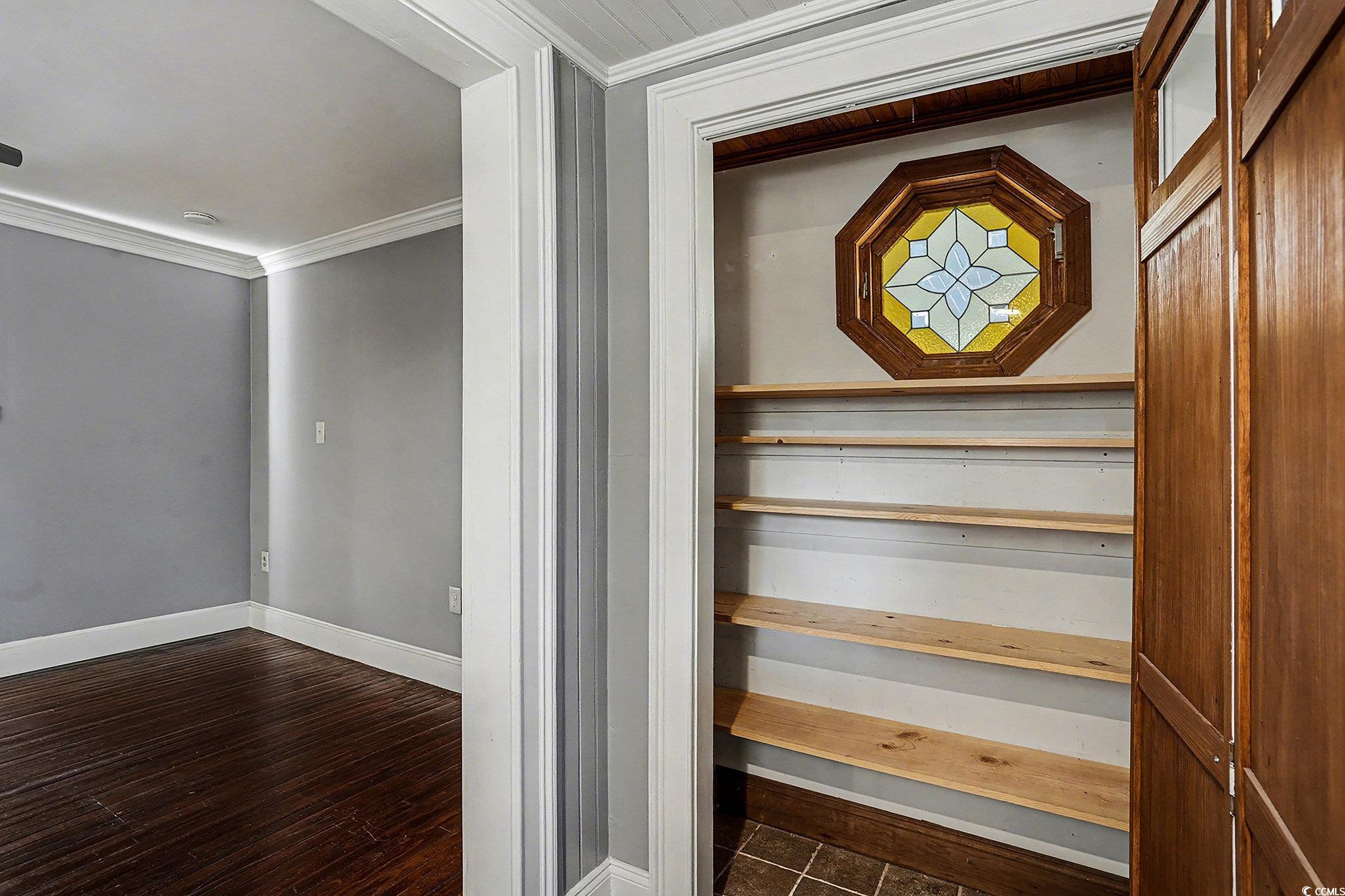 218 Busbee Street Conway, SC 29526 - Photo 13 of 30 Stairs featuring ornamental molding and wood-type flooring