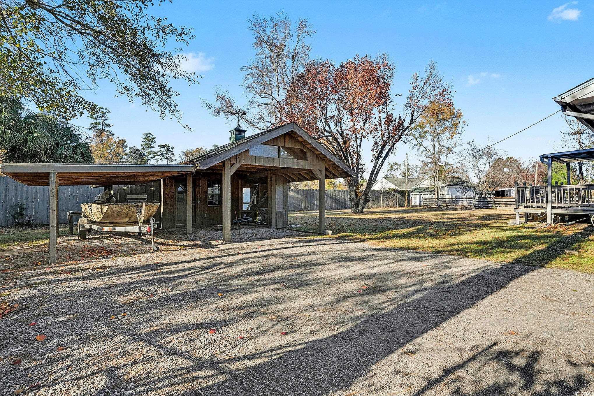 218 Busbee Street Conway, SC 29526 - Photo 28 of 30 Exterior space featuring a carport