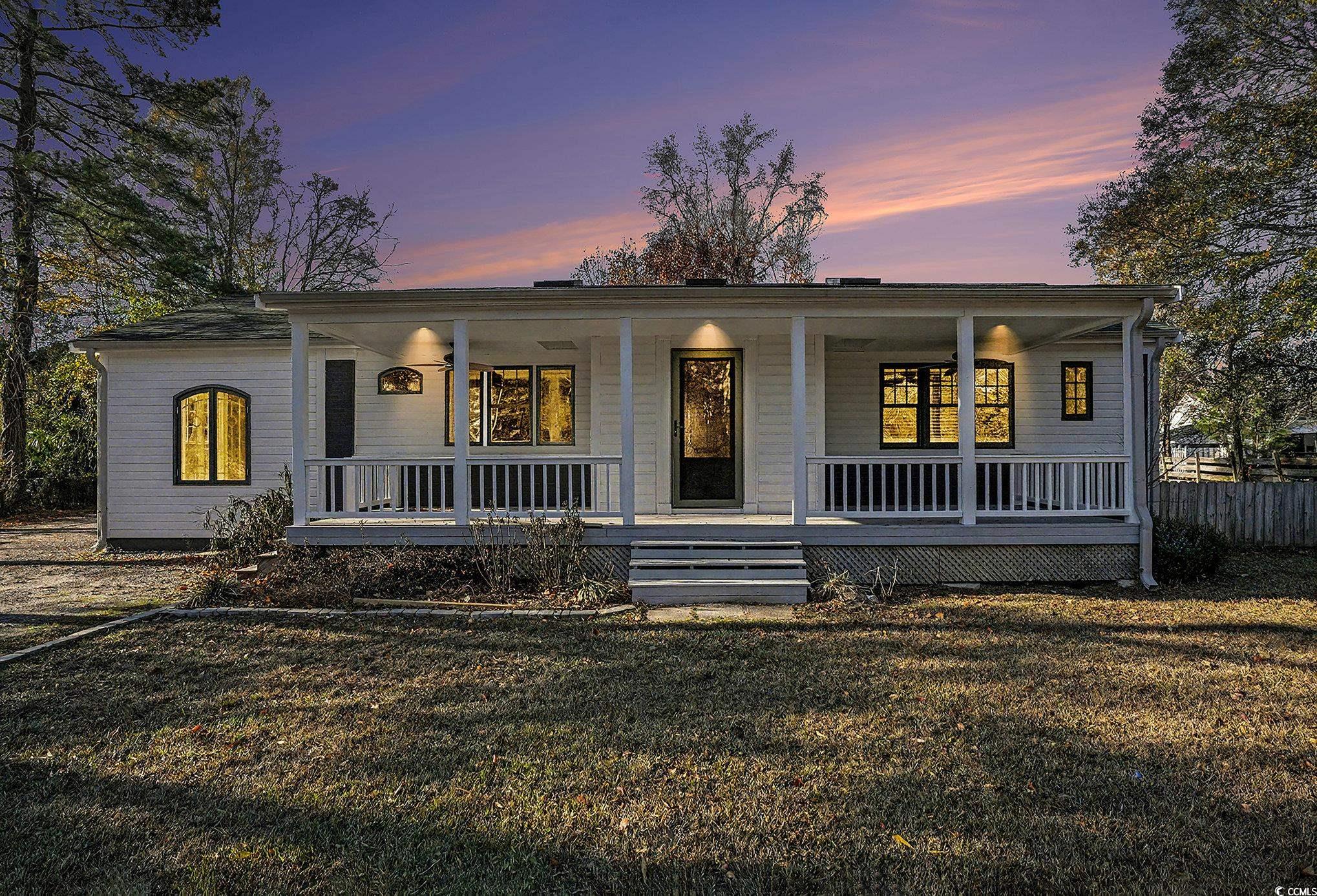 218 Busbee Street Conway, SC 29526 - Photo 30 of 30 Bungalow-style house with a porch and a yard