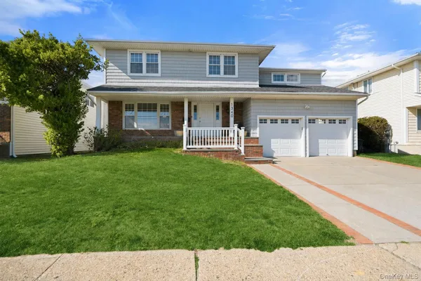 a house view with a garden space