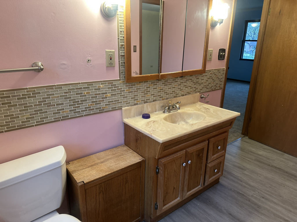 2272 Asbury Road Northbrook, IL 60062 - Photo 19 of 22 a utility room with a sink washer and dryer
