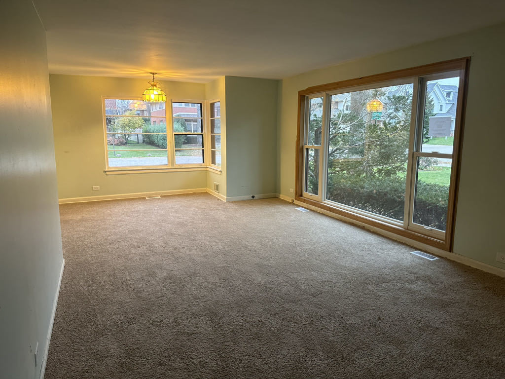 2272 Asbury Road Northbrook, IL 60062 - Photo 2 of 22 a view of an empty room with a window