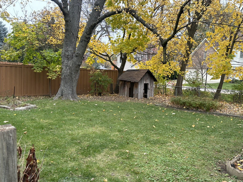 2272 Asbury Road Northbrook, IL 60062 - Photo 22 of 22 a front view of a house with garden