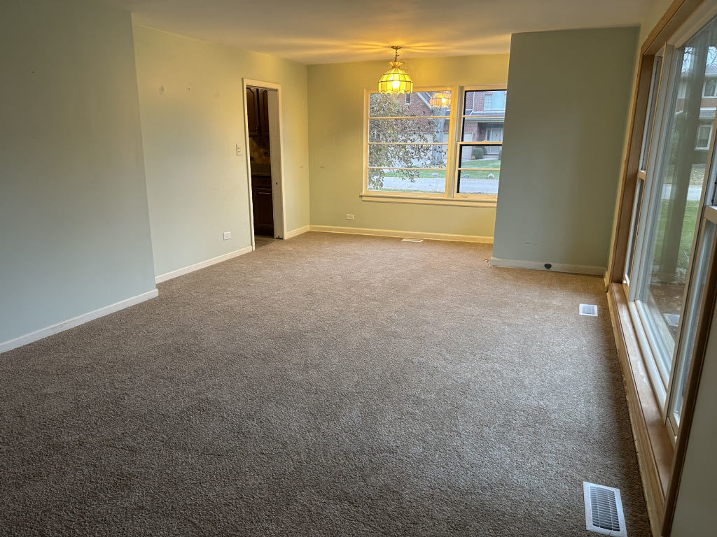2272 Asbury Road Northbrook, IL 60062 - Photo 3 of 22 a view of an empty room with a window