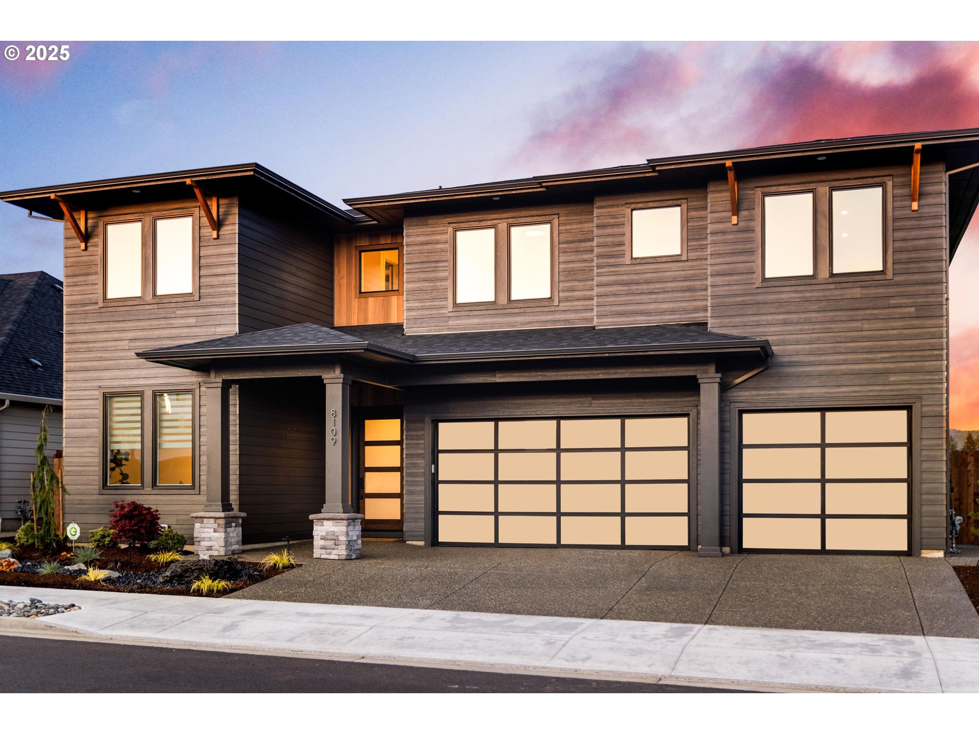 a front view of a house with a parking area