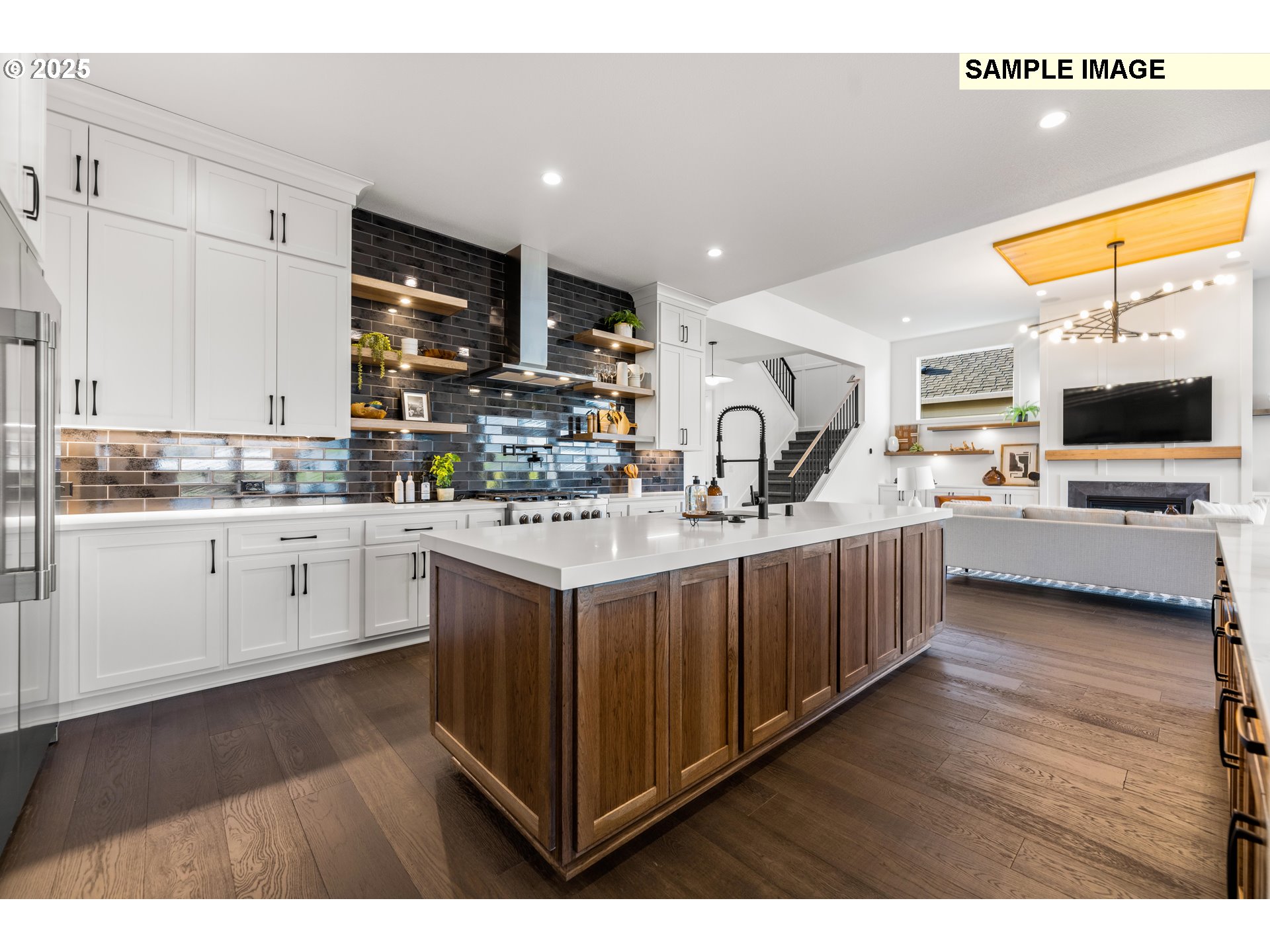 2003 Northwest 121st Street Vancouver, WA 98685 - Photo 21 of 48 a kitchen with stainless steel appliances kitchen island granite countertop a sink stove and cabinets