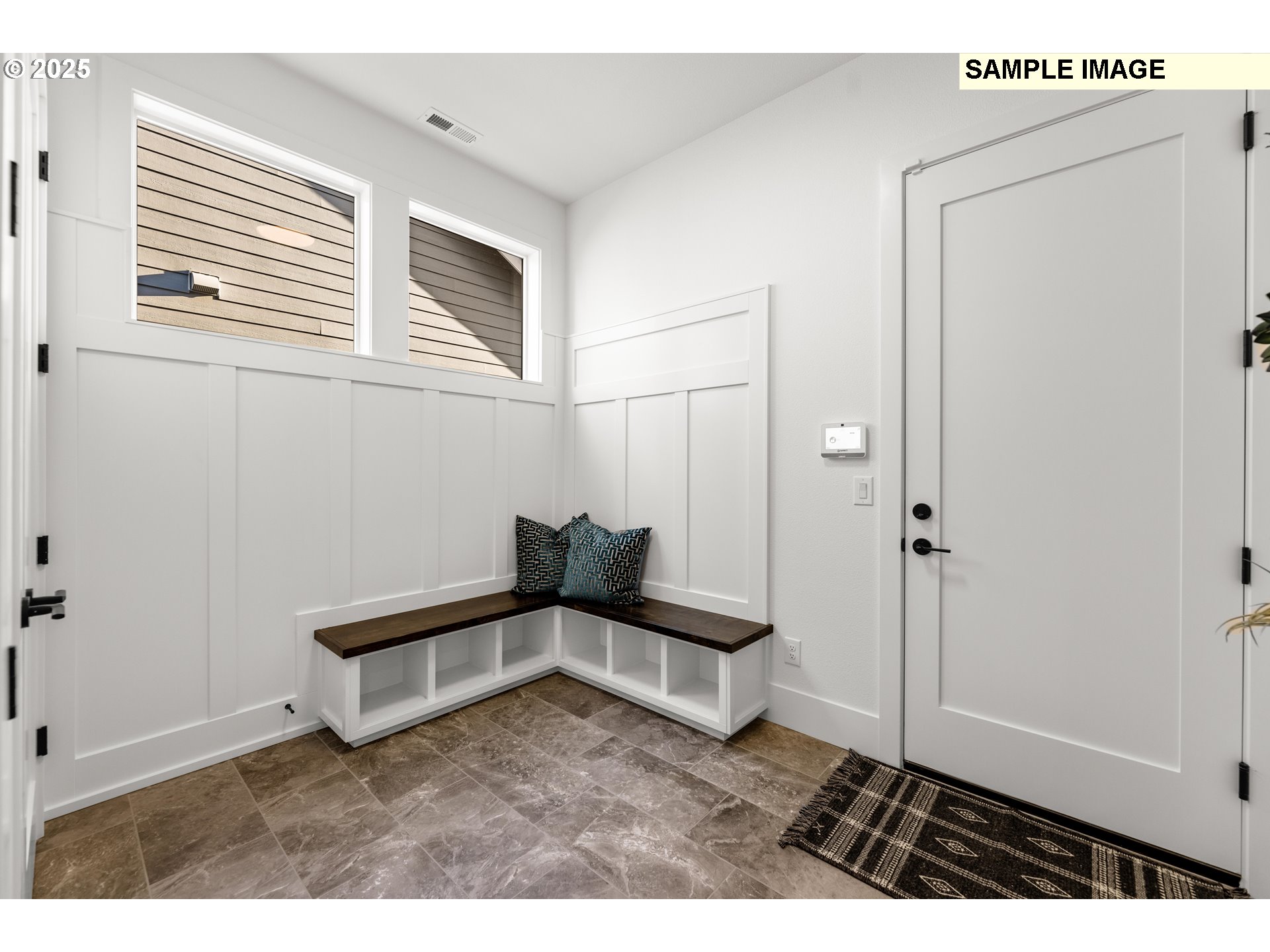 2003 Northwest 121st Street Vancouver, WA 98685 - Photo 28 of 48 a view of a livingroom with wooden floor and a hallway