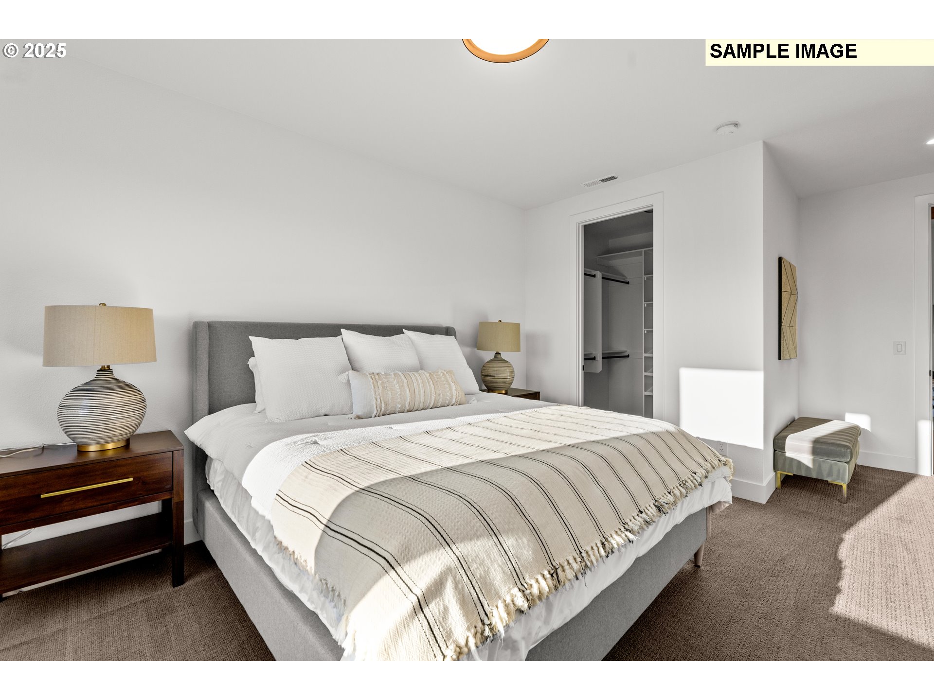 2003 Northwest 121st Street Vancouver, WA 98685 - Photo 33 of 48 a bedroom with a bed and a lamp