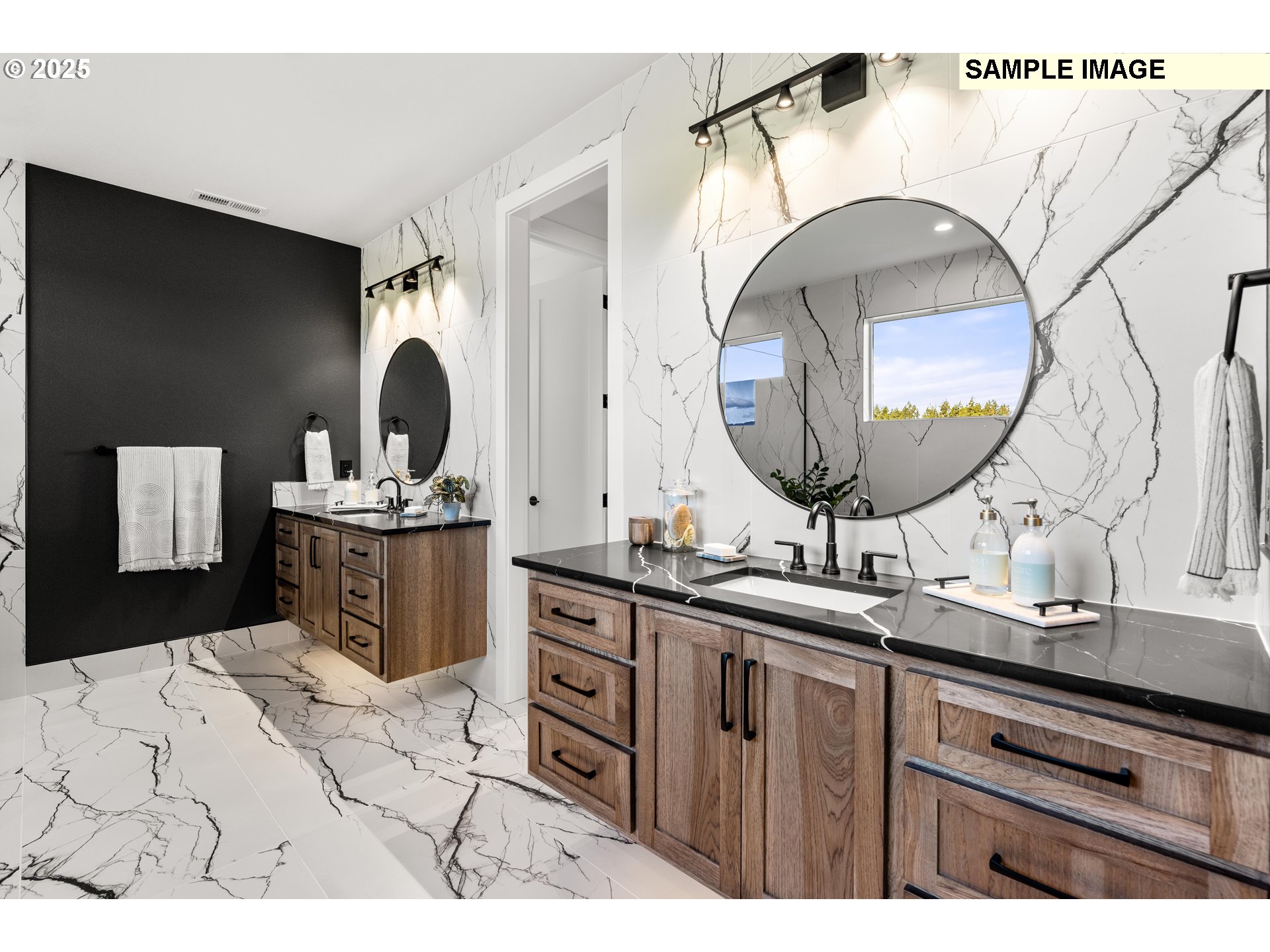 2003 Northwest 121st Street Vancouver, WA 98685 - Photo 40 of 48 a en suite bathroom with a double vanity sink and a mirror