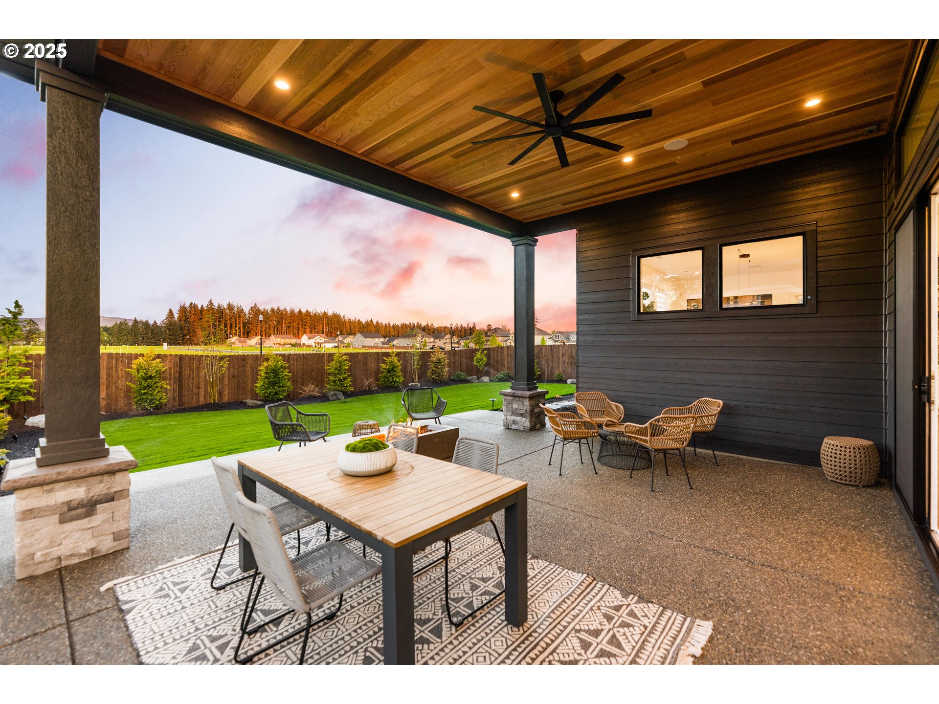 2003 Northwest 121st Street Vancouver, WA 98685 - Photo 4 of 48 a backyard of a house with a table and chairs