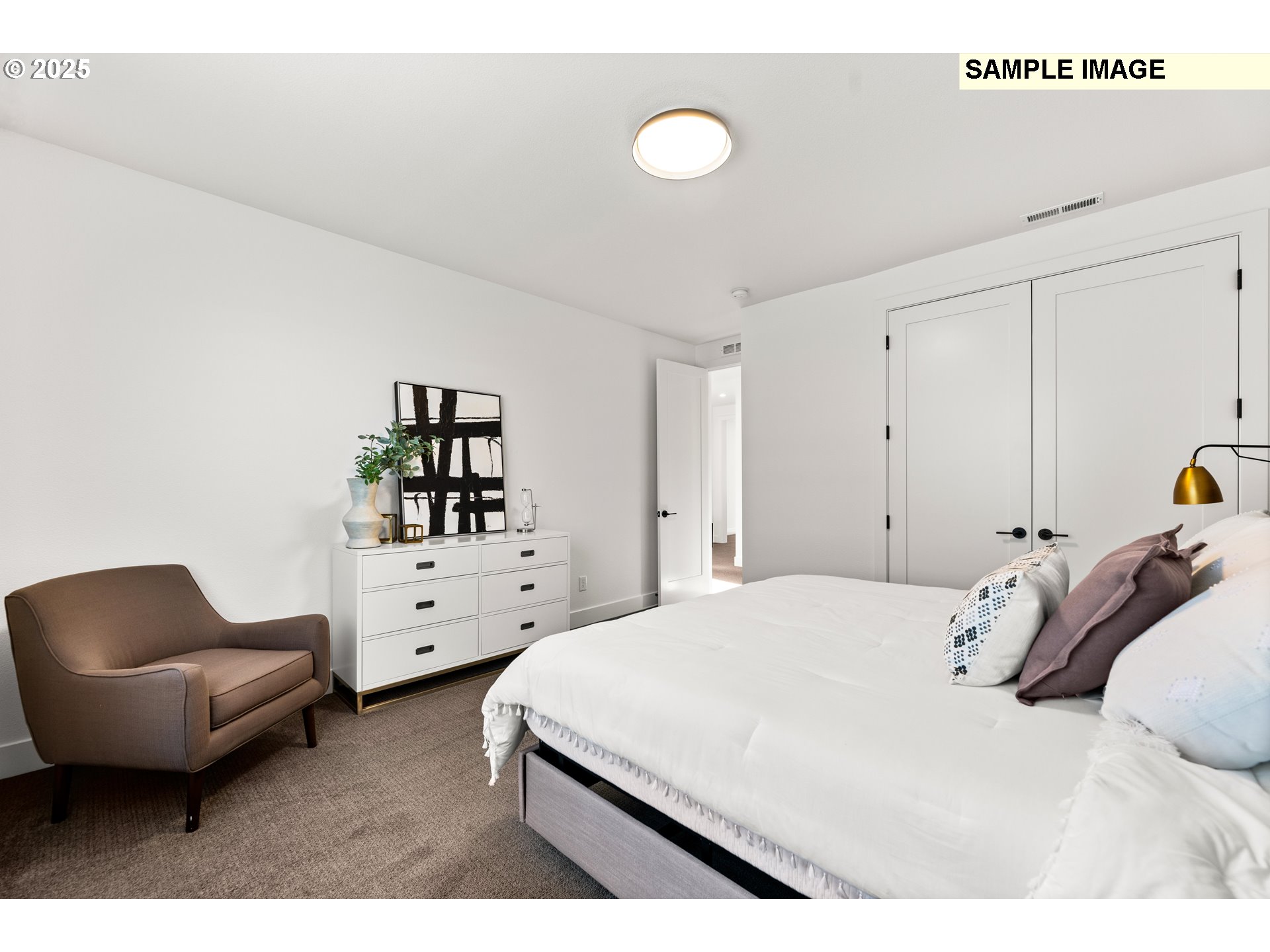 2003 Northwest 121st Street Vancouver, WA 98685 - Photo 45 of 48 a bedroom with a bed and a couch