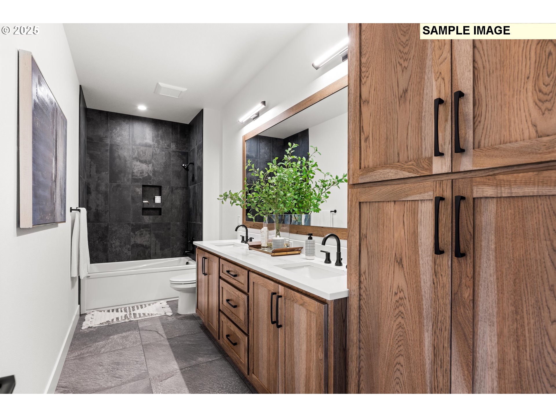 2003 Northwest 121st Street Vancouver, WA 98685 - Photo 46 of 48 a bathroom with a sink a mirror and a bathtub