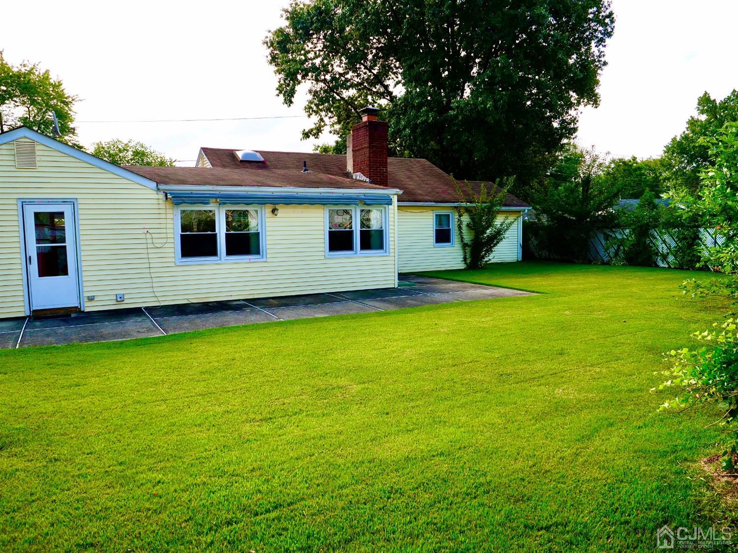 5 Idlewild Road Edison, NJ 08817 - Photo 3 of 13 a front view of house with yard and trees