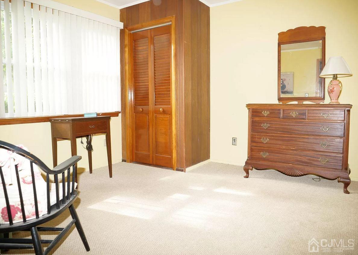 5 Idlewild Road Edison, NJ 08817 - Photo 5 of 13 a view of a room with furniture and a window