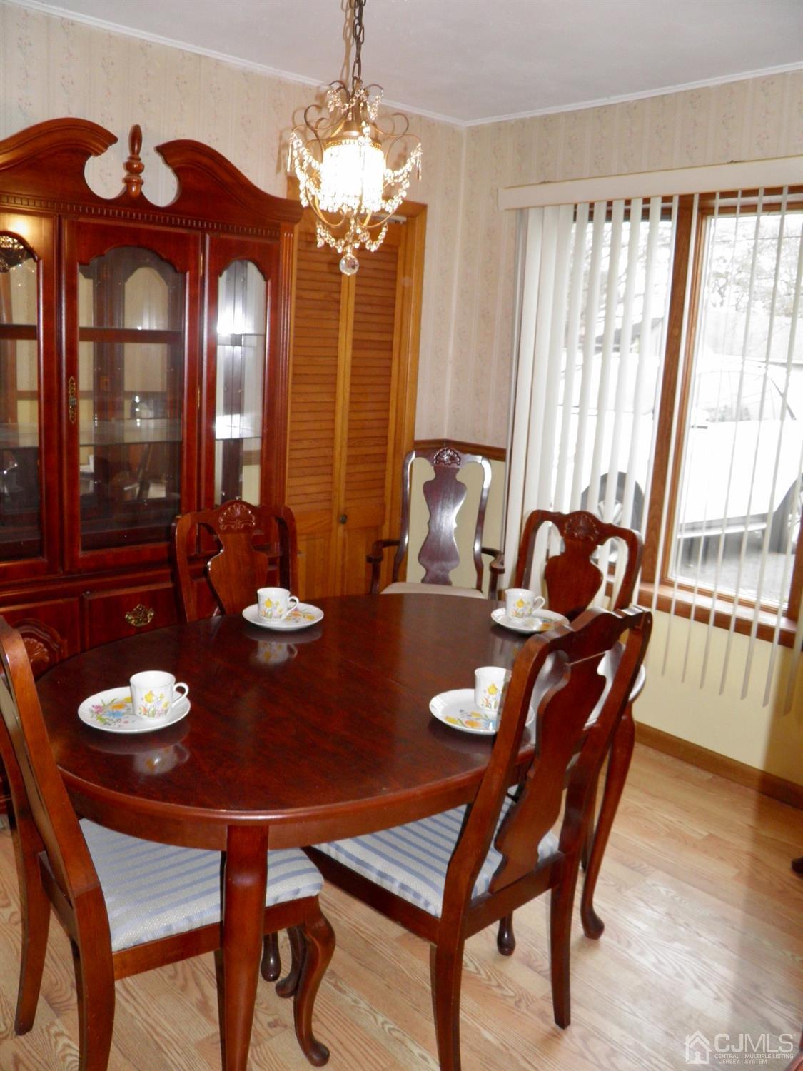 5 Idlewild Road Edison, NJ 08817 - Photo 7 of 13 a view of a dining room with furniture and window