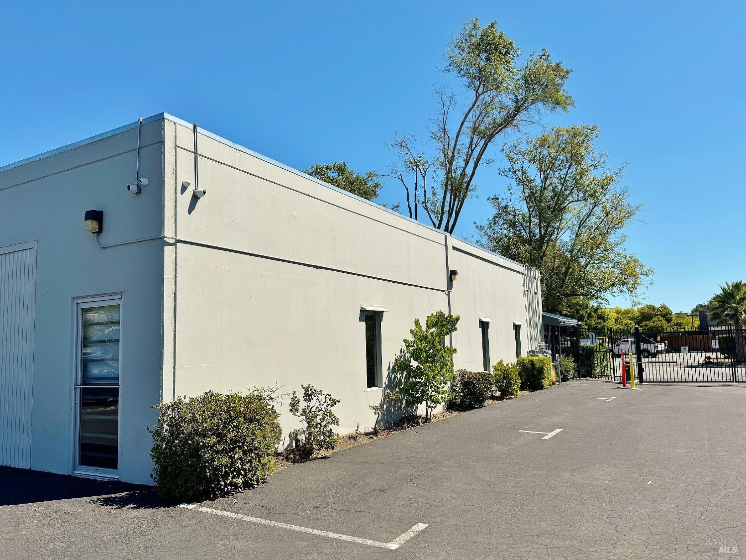 14 Commercial Boulevard, Unit 133 Novato, CA 94949 - Photo 3 of 10 a view of a street with a building in the background