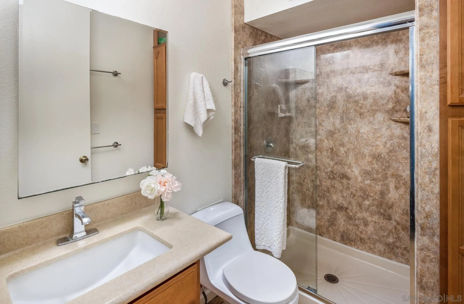 6455 La Jolla Boulevard, Unit 203 La Jolla, CA 92037 - Photo 11 of 21 a bathroom with a sink toilet and shower