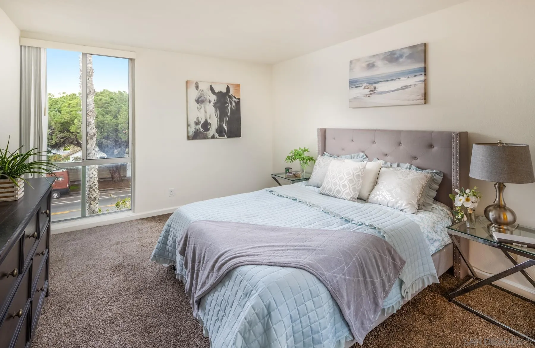 6455 La Jolla Boulevard, Unit 203 La Jolla, CA 92037 - Photo 13 of 21 a bedroom with bed and a window