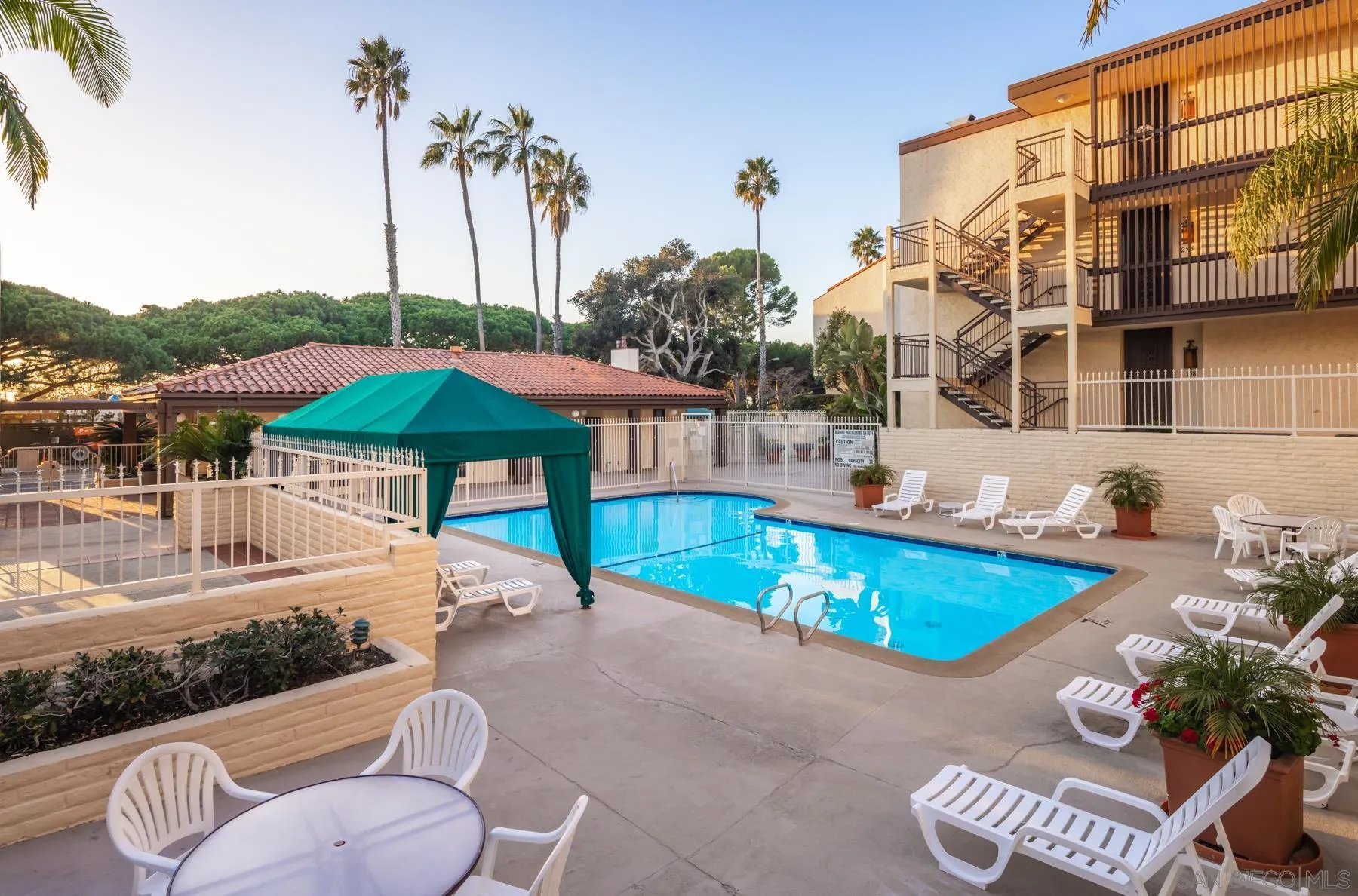 6455 La Jolla Boulevard, Unit 203 La Jolla, CA 92037 - Photo 16 of 21 an outdoor space with pool and furniture