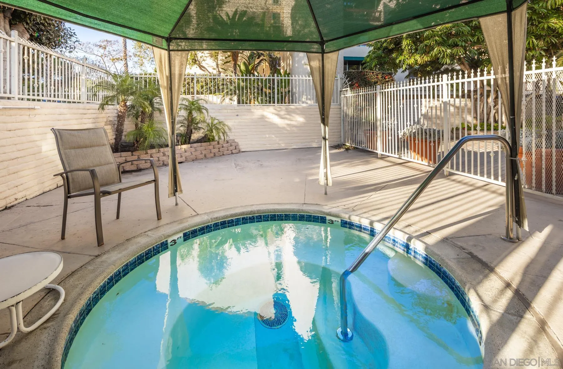 6455 La Jolla Boulevard, Unit 203 La Jolla, CA 92037 - Photo 17 of 21 a view of a swimming pool with a patio