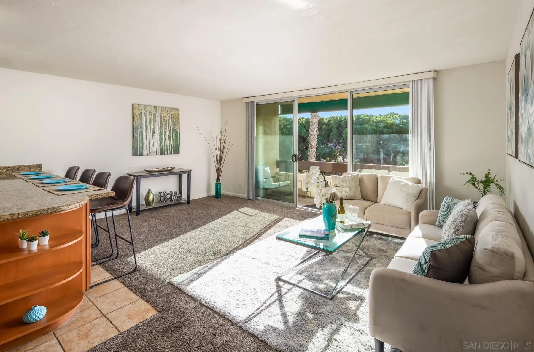 6455 La Jolla Boulevard, Unit 203 La Jolla, CA 92037 - Photo 3 of 21 a living room with furniture and a window