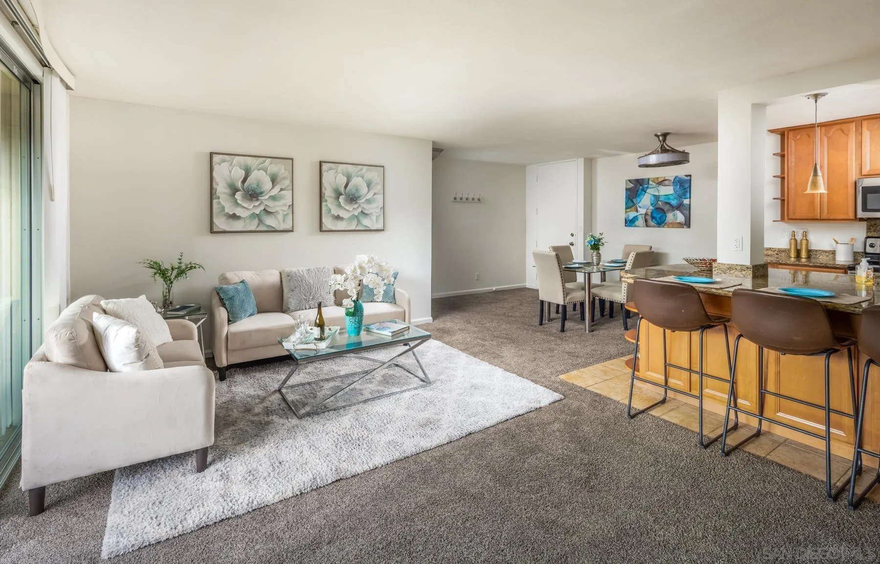 6455 La Jolla Boulevard, Unit 203 La Jolla, CA 92037 - Photo 6 of 21 a living room with furniture and a couch