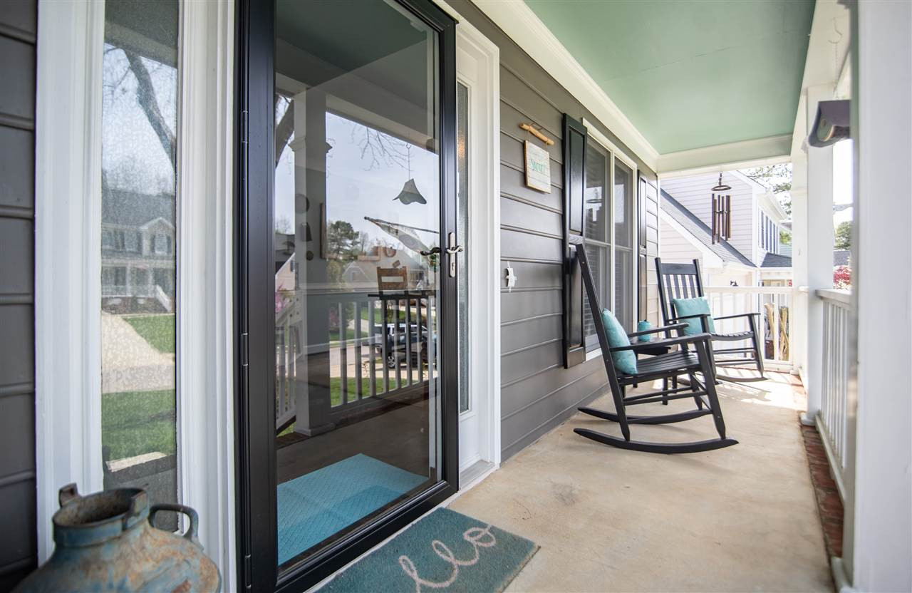 9116 Dawnshire Road Raleigh, NC 27615 - Photo 4 of 30 Sip some sweet tea in your rocking chairs on this lovely front porch. Front Porch