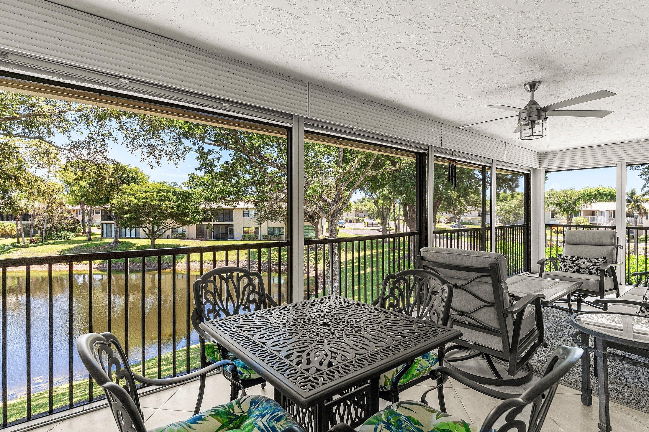 36 Westgate Lane, Unit D Boynton Beach, FL 33436 - Photo 24 of 51 a view of a city from a balcony with furniture