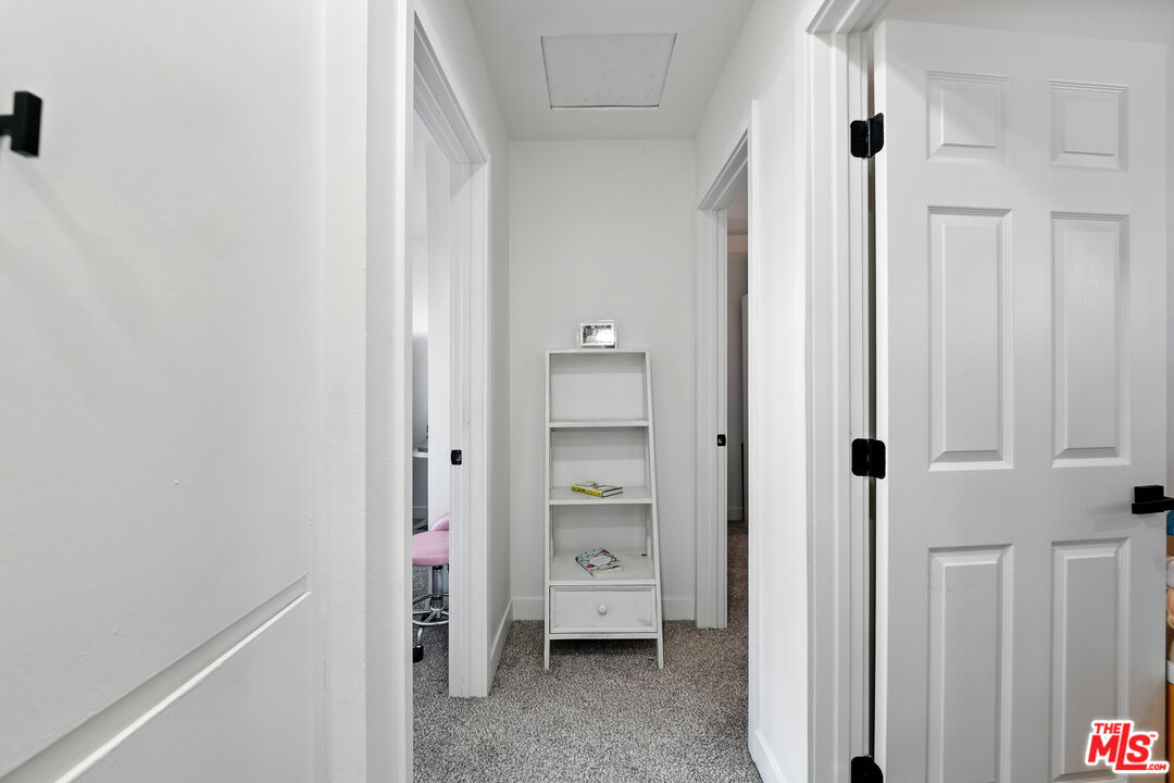 21312 Island Avenue Carson, CA 90745 - Photo 19 of 26 a view of an empty room with a fireplace