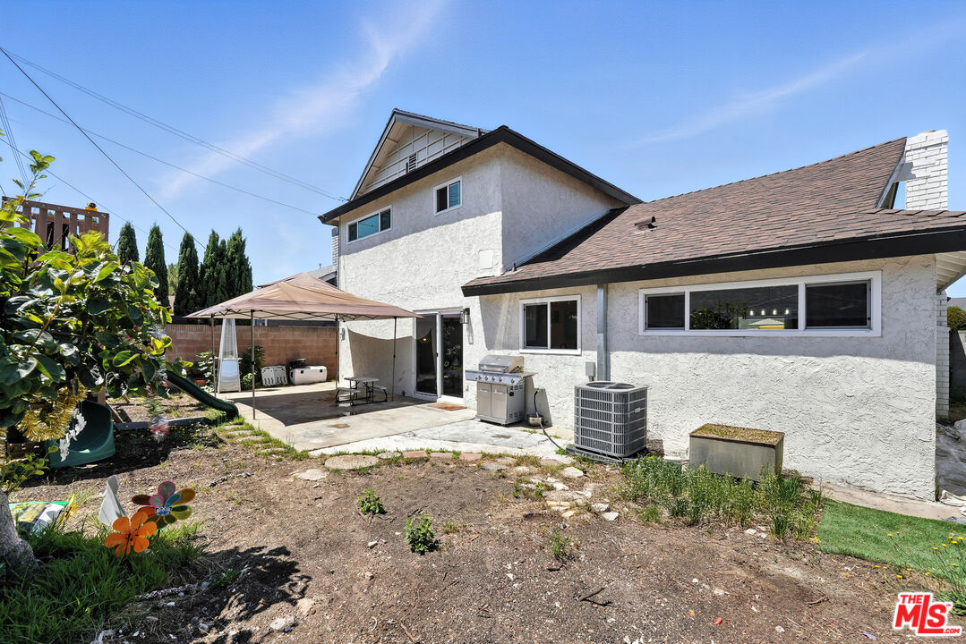 21312 Island Avenue Carson, CA 90745 - Photo 21 of 26 a front view of a house with garden