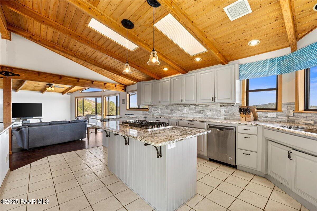 14195 Tapper Trail Prescott, AZ 86305 - Photo 12 of 46 a kitchen with a stove sink and cabinets