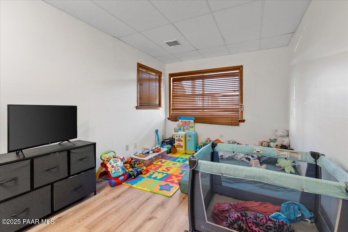 14195 Tapper Trail Prescott, AZ 86305 - Photo 35 of 46 a room with furniture and a flat screen tv