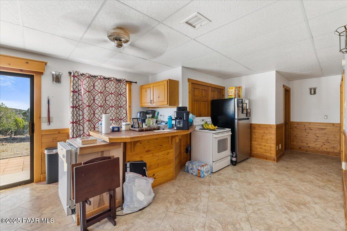 14195 Tapper Trail Prescott, AZ 86305 - Photo 38 of 46 a view of a kitchen with furniture and a window