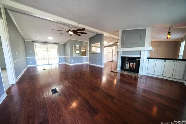 a view of livingroom with furniture and fireplace