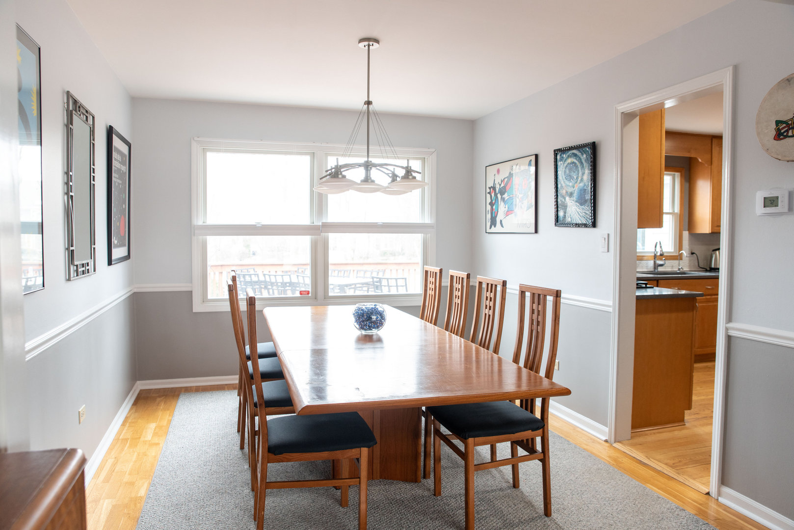 1410 Daly Road Wheaton, IL 60187 - Photo 16 of 34 a view of a dining room with furniture window and wooden floor