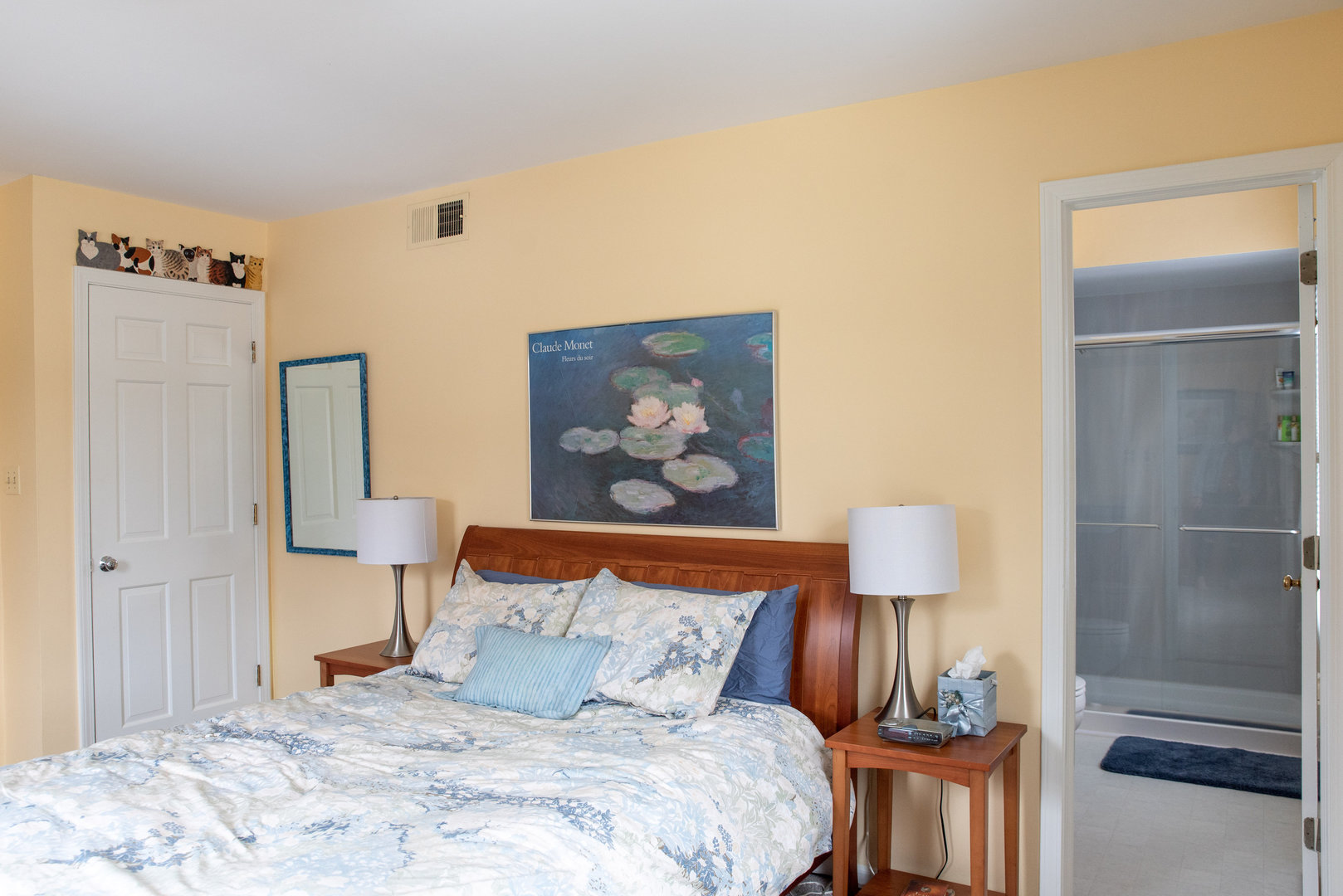 1410 Daly Road Wheaton, IL 60187 - Photo 23 of 34 a bedroom with a bed and a painting on the wall