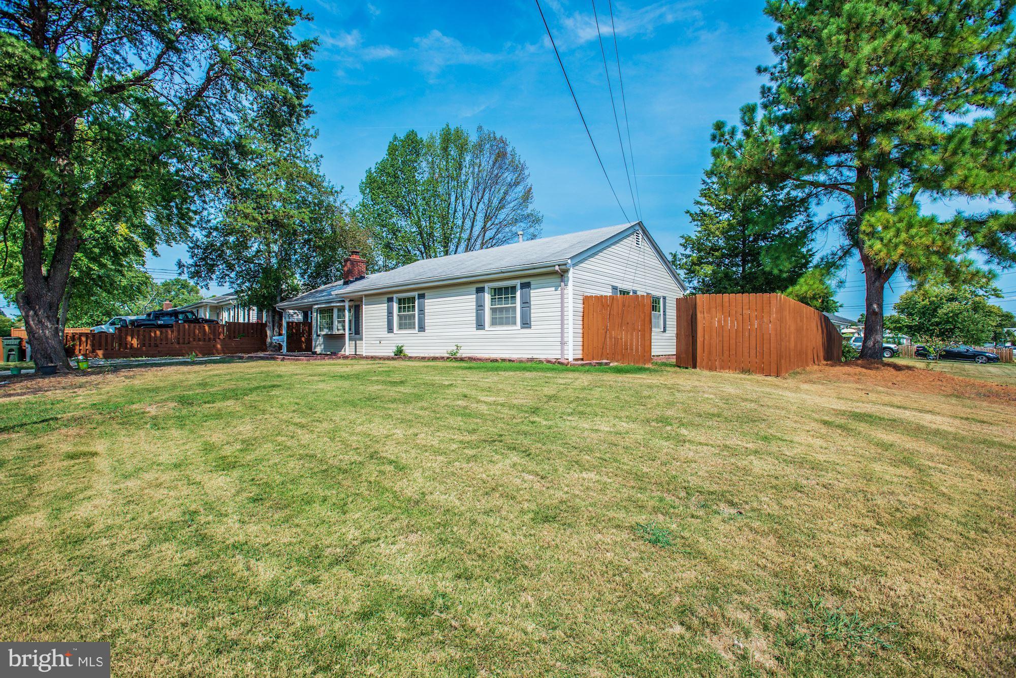 6708 Cimarron Street Springfield, VA 22150 - Photo 1 of 46 a house view with a garden space