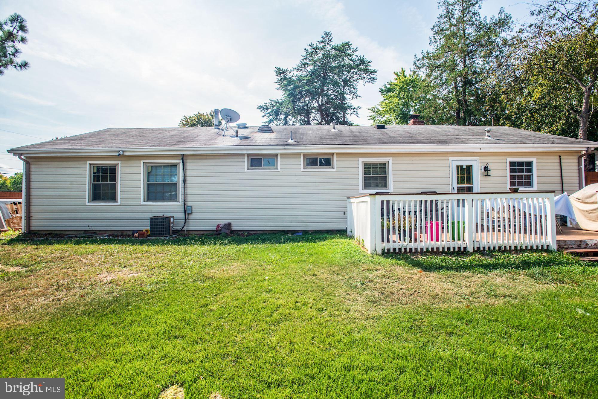 6708 Cimarron Street Springfield, VA 22150 - Photo 42 of 46 a view of a house with a backyard