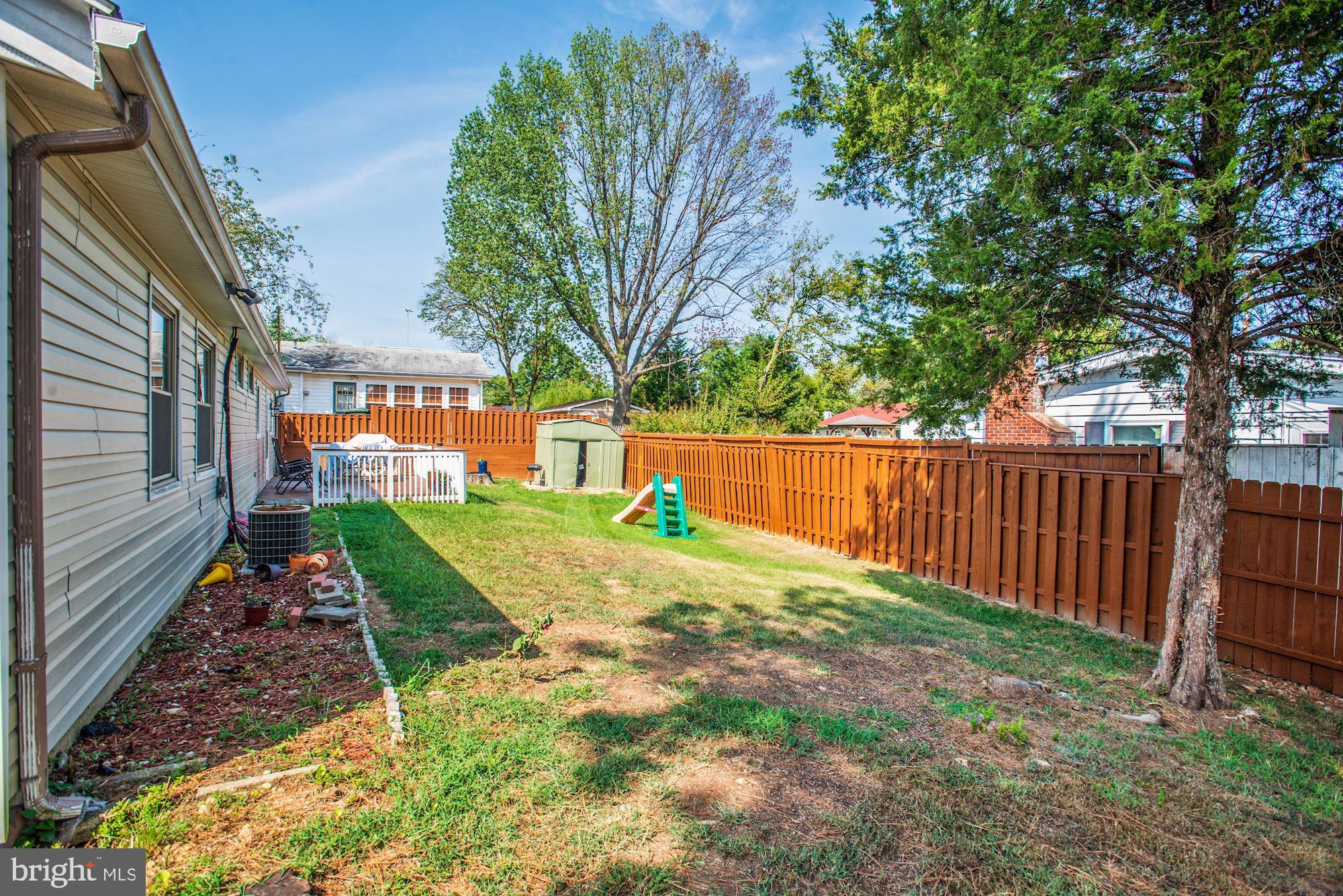 6708 Cimarron Street Springfield, VA 22150 - Photo 45 of 46 a view of backyard with tree