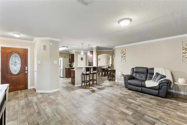 a view of a livingroom with furniture and a couch